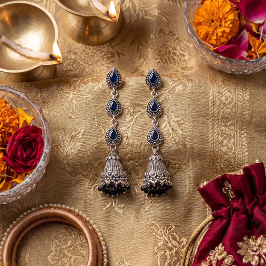 Blue stone jhumka earrings for traditional jewellery for women.