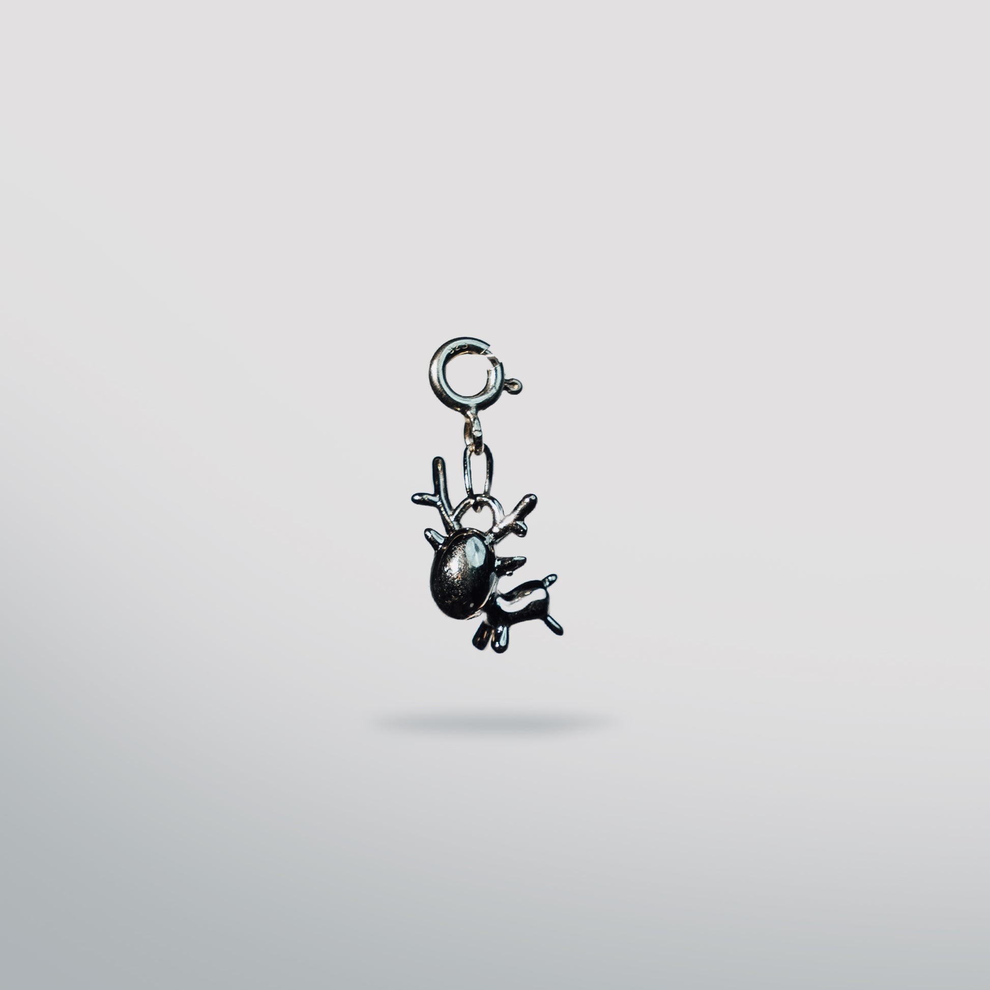 Sterling silver reindeer charm