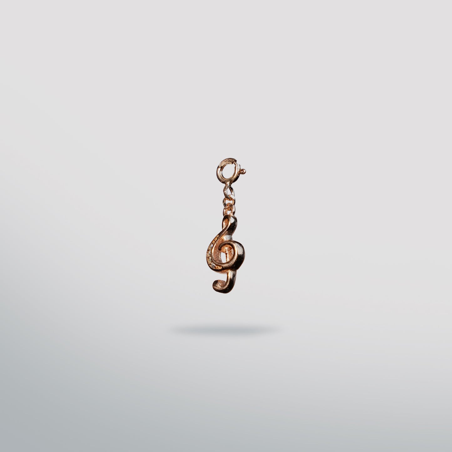 Sterling silver rose gold music note clef charm