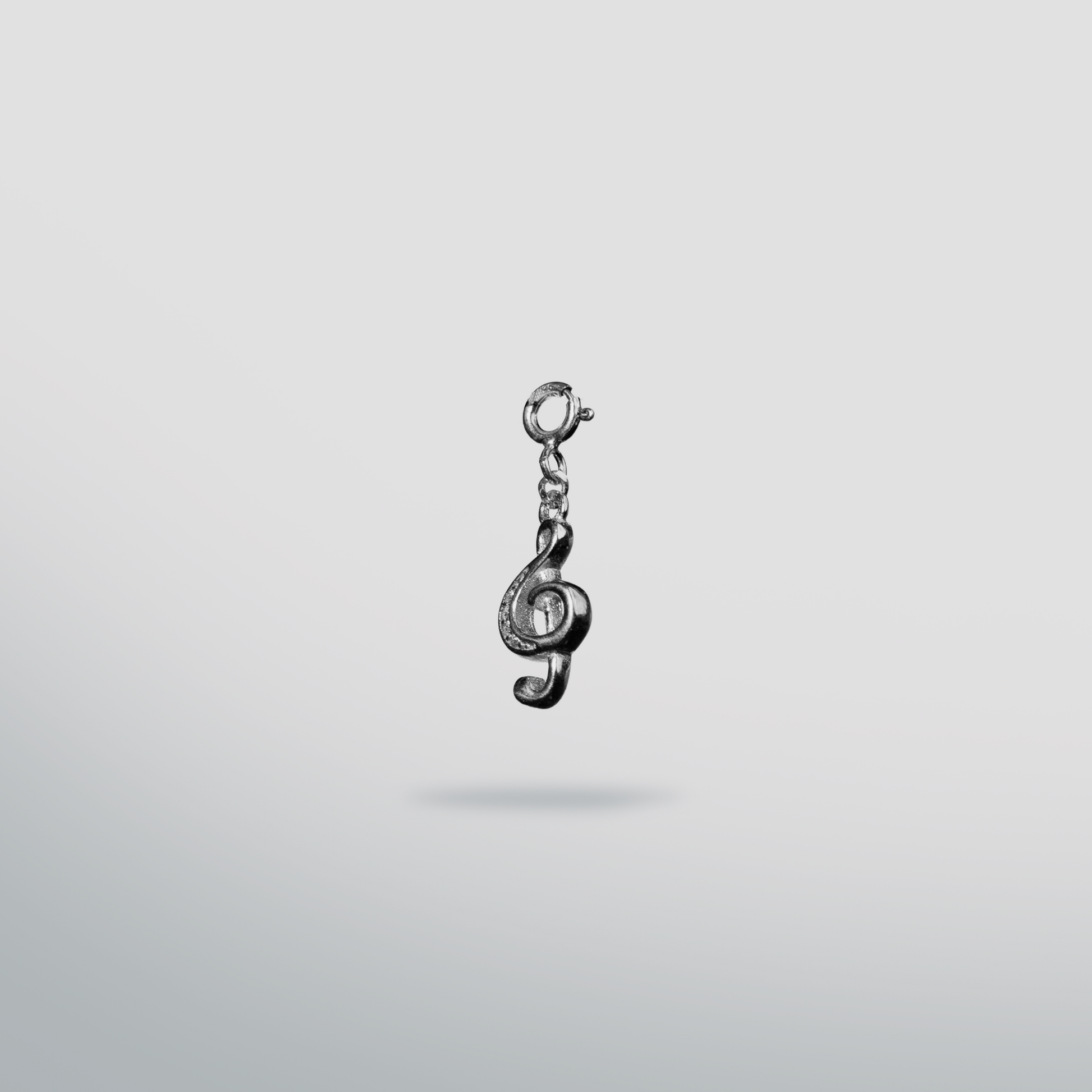 Sterling silver music note clef charm