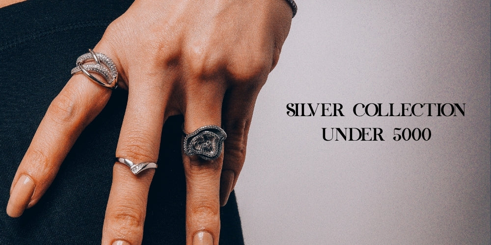 Minimalist sterling silver rings with a contemporary crossover style.