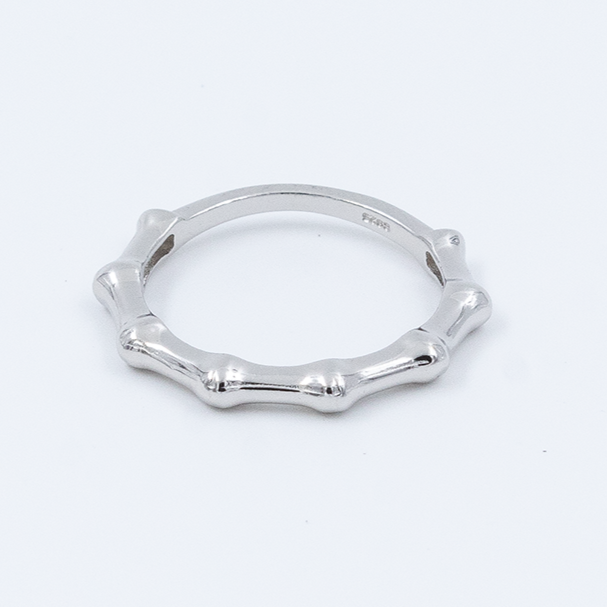 A silver ring with a bamboo stem design, featuring jointed details and a smooth finish.