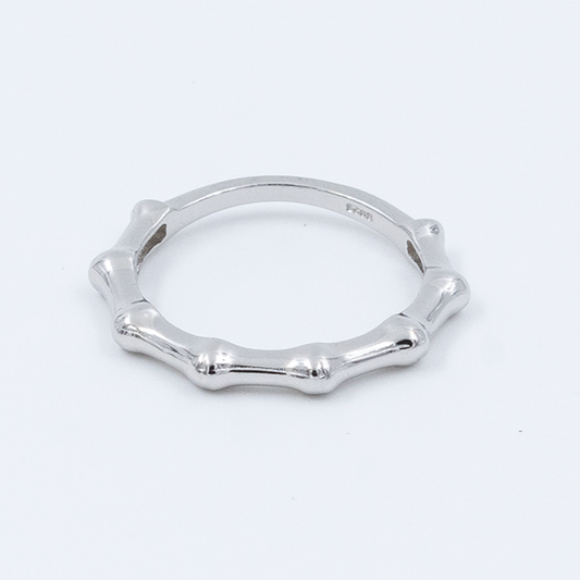 A silver ring with a bamboo stem design, featuring jointed details and a smooth finish.
