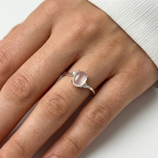Close up of a hand wearing a ring with a rose quarts and two diamonds in the side, silver ring women, Silver ring, real silver ring, 925 silver ring