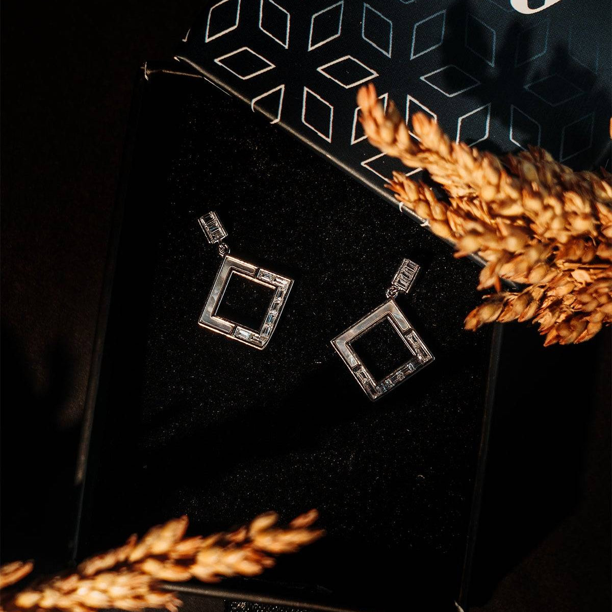 Sterling silver dangling square earrings with mother of pearl in elfy box
