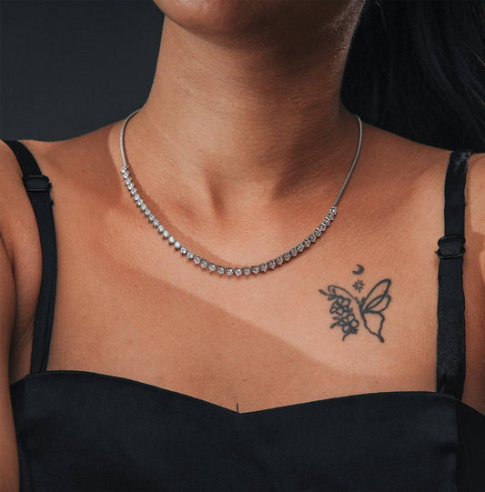 Half Solitaire Chain dangling on the neck