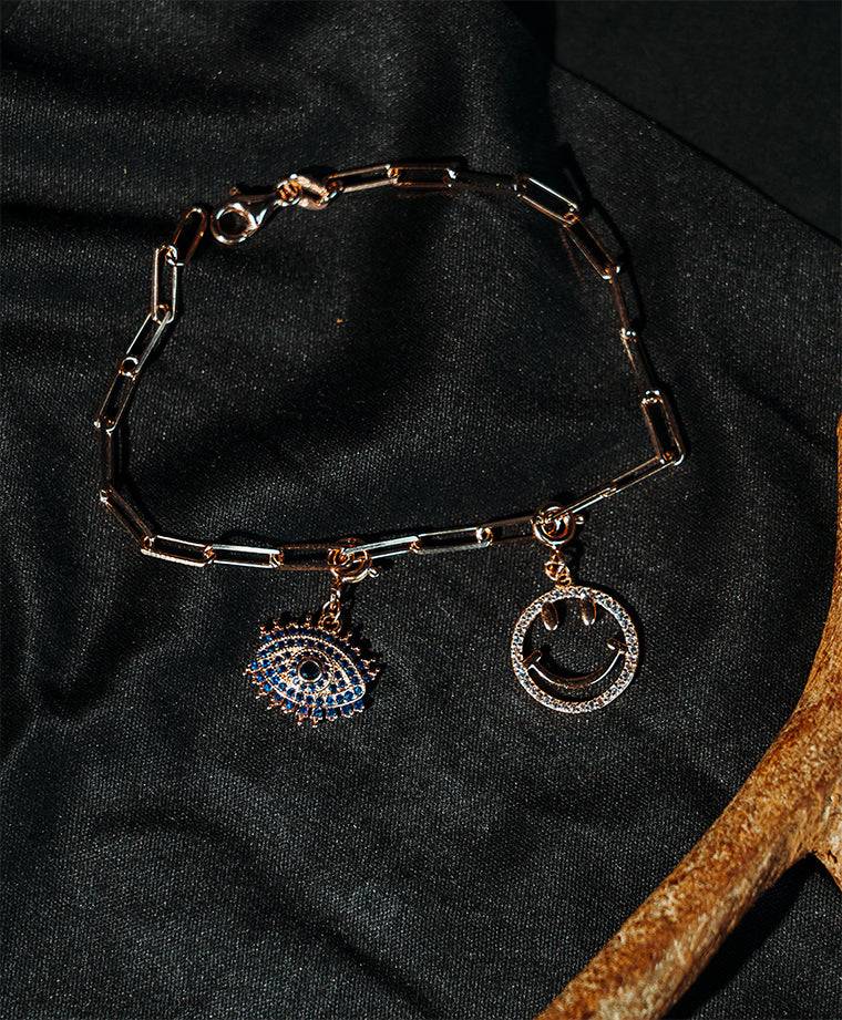 Sterling silver paperclip charm bracelet in rose gold with charms