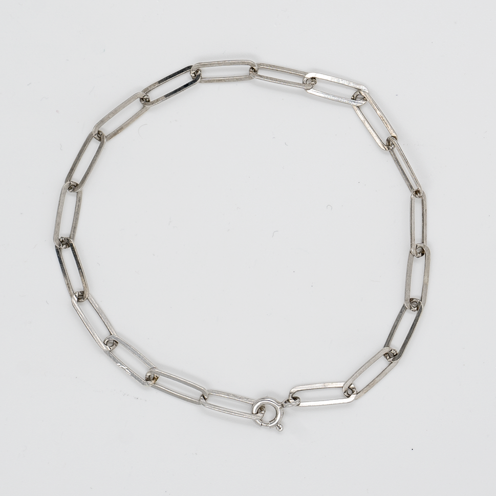 Sterling Silver Paperclip Charm Bracelet on white background