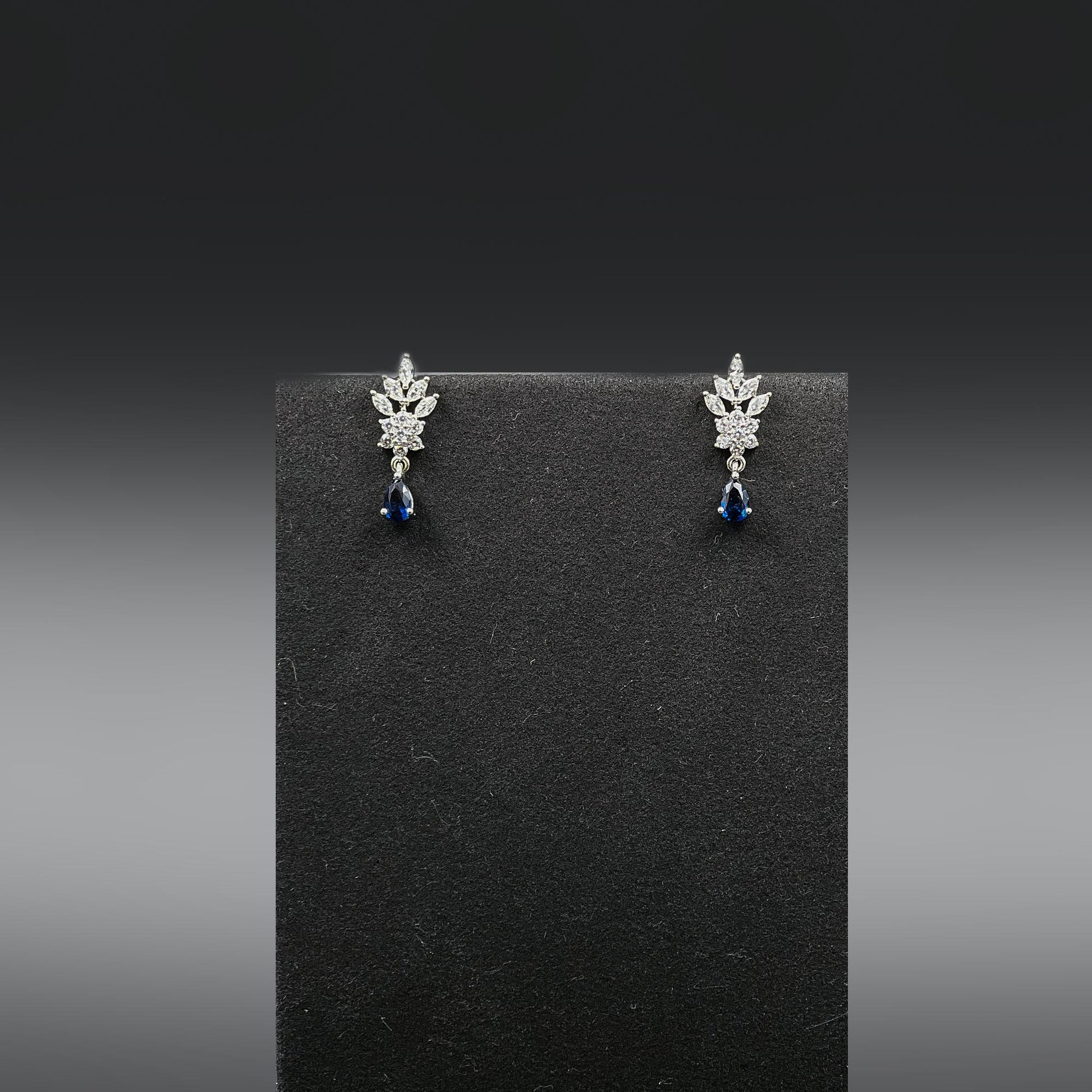 Eternal Blue Mangalsutra earrings on earring stand
