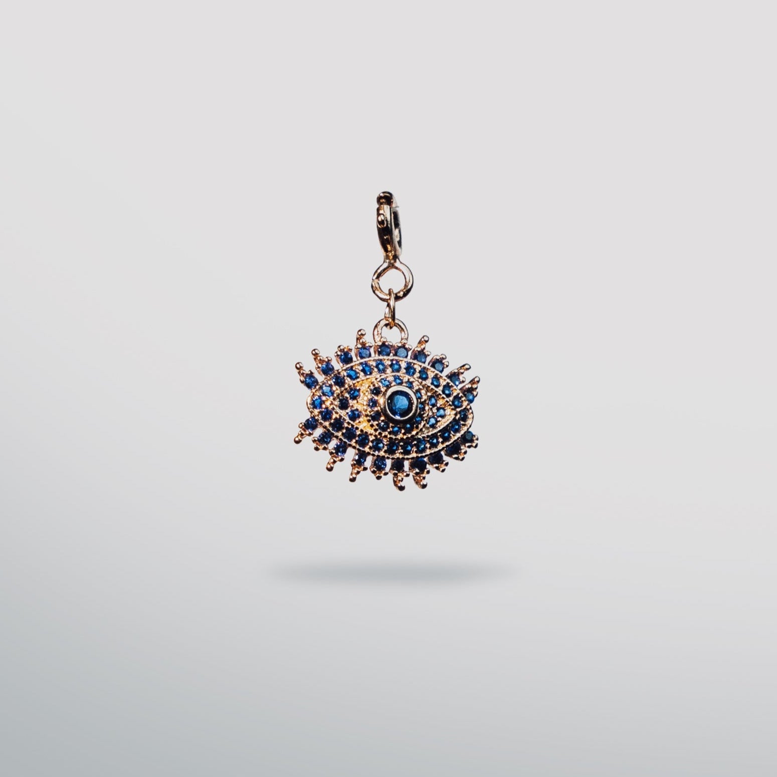 Sterling silver rose gold evil eye charm