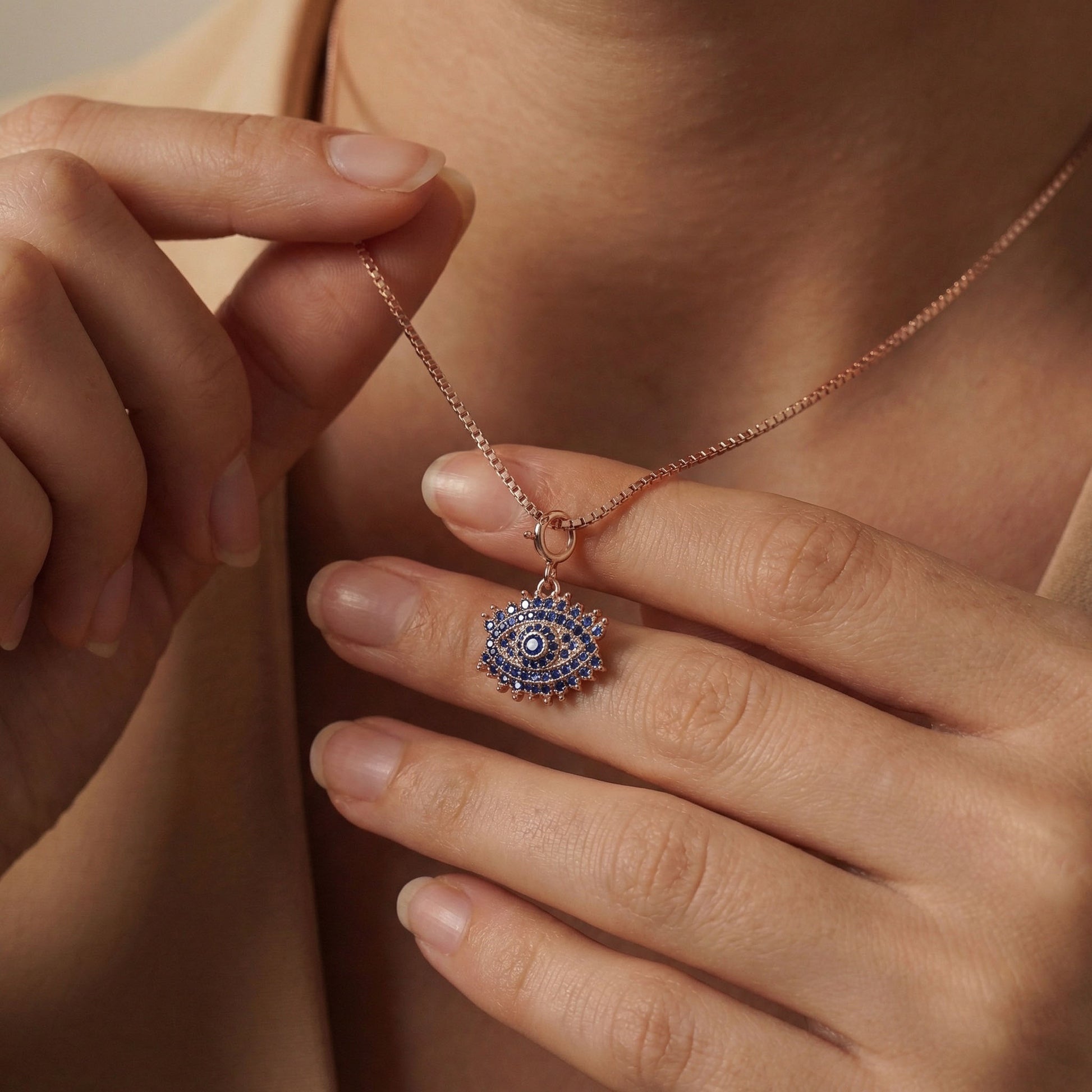Evil eye charm in rose gold