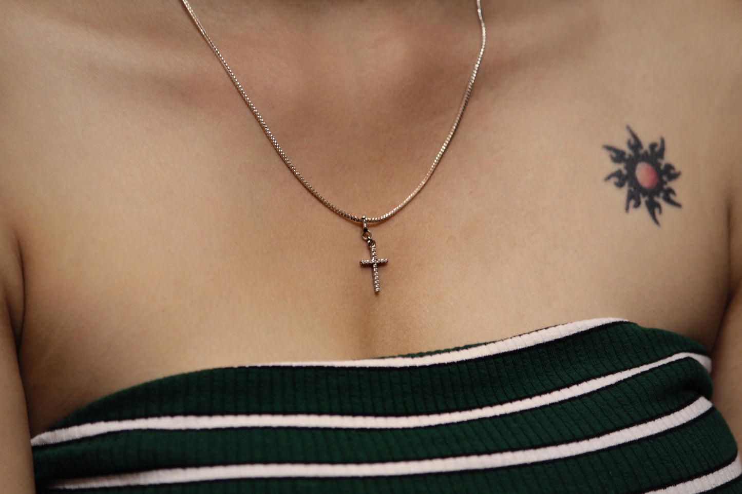 Sterling silver cross charm with blush chain