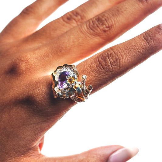 A beautiful ring with amethyst stone and a beautiful garden like pattern
