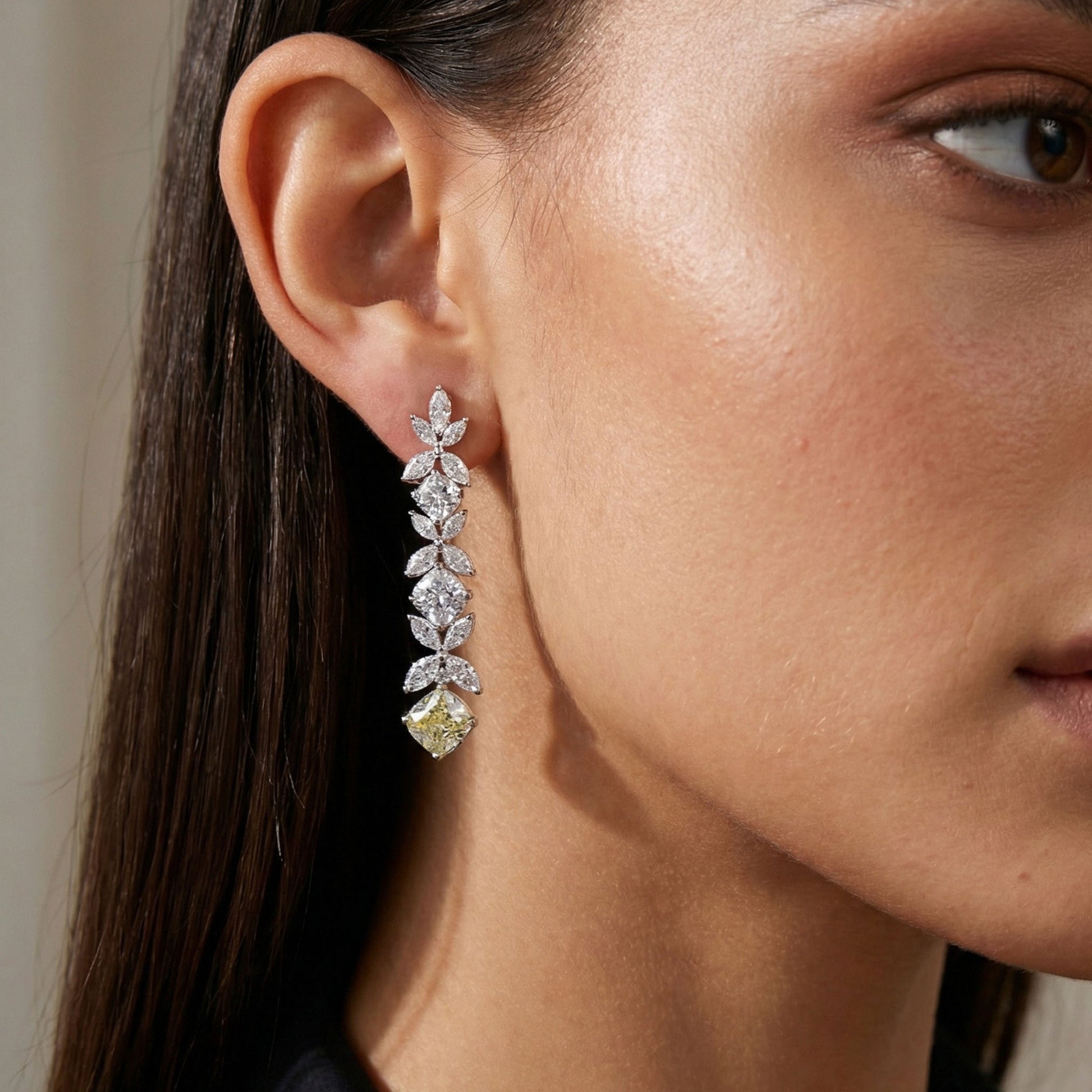 Elfy golden petal earrings with 4 petal flower stone design with 3 flowers hanging and a beautiful square  yellow stone hanging at the most bottom. best for a date night gift and perfect for first night gift too