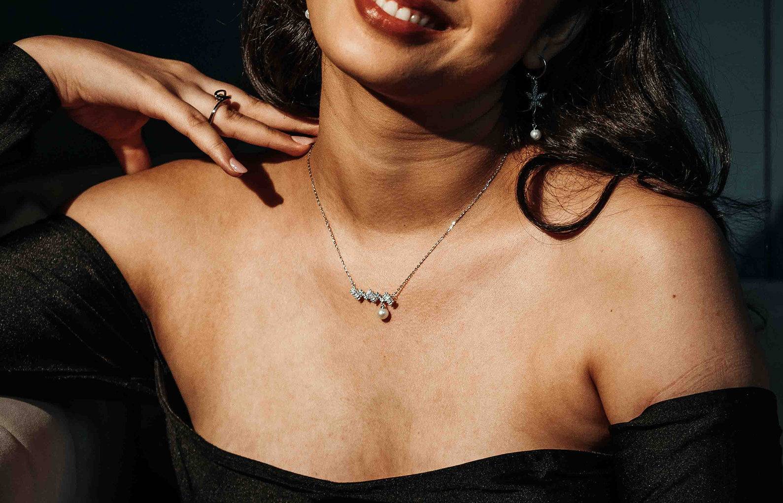 Sterling silver ice pearl pendant on a model in silver color