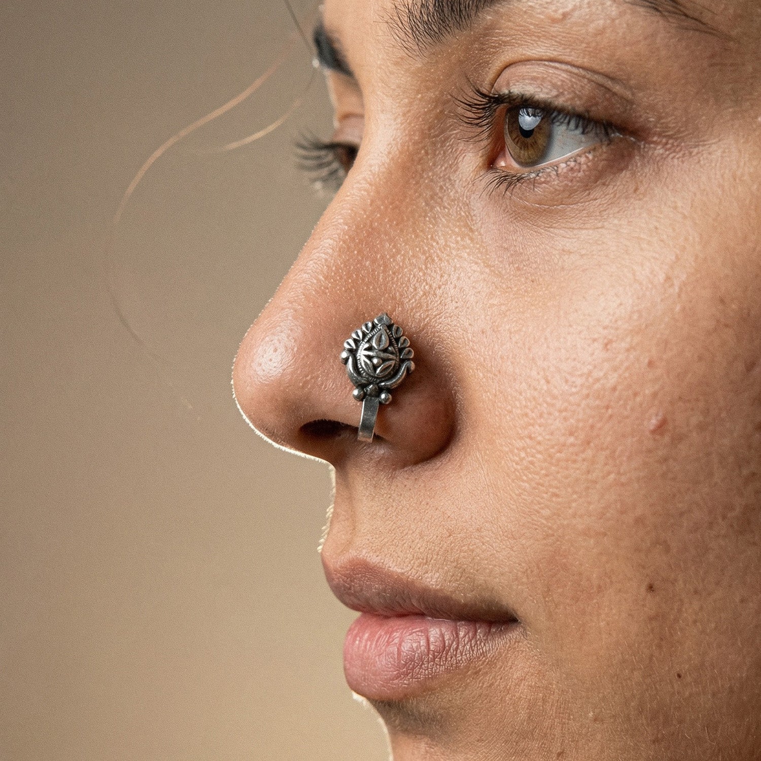 925 Silver nosepin on a lady's nose