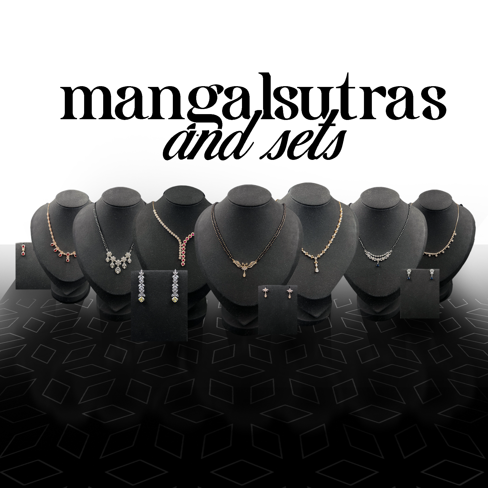Jewelry display with mangalsutras and sets on black mannequin stands against a white background.