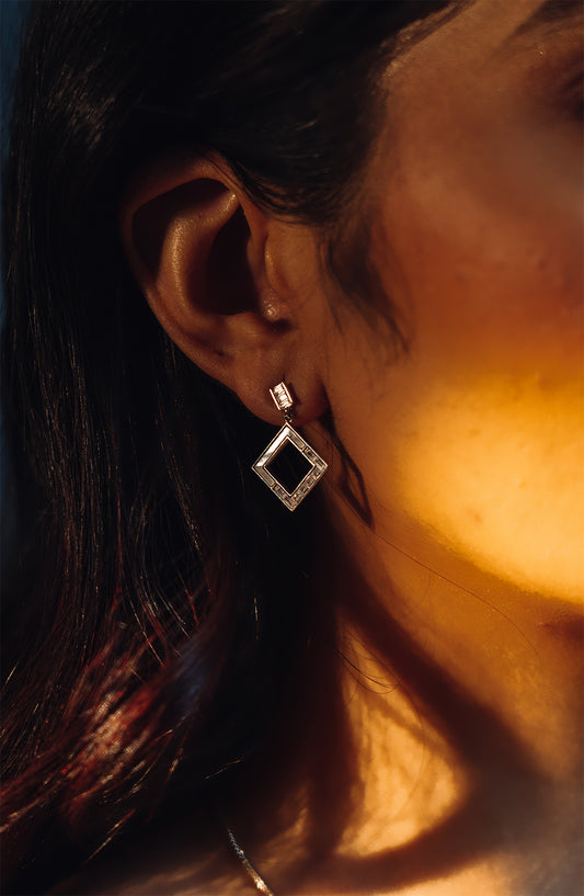 Sterling silver dangling square earrings with mother of pearl