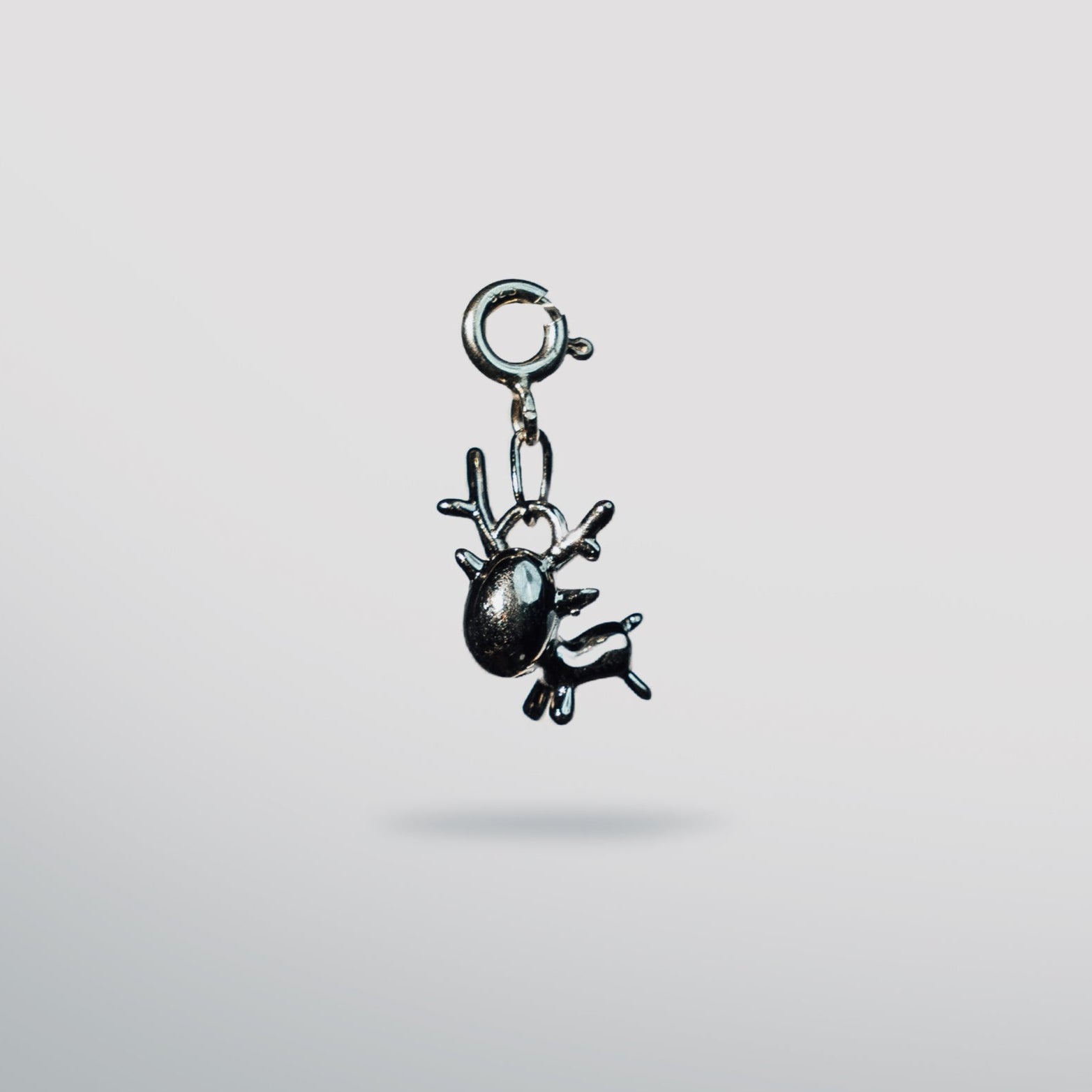 Sterling silver reindeer charm