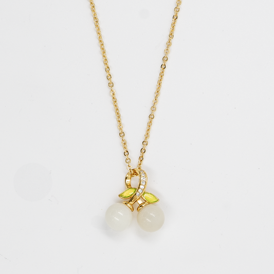 Elfy 925 Sterling Silver gold-plated necklace featuring a whimsical cherry pendant with two white round stones and vibrant green leaves on a white background—A chic and unique nature-inspired jewelry gift for her in 2026.