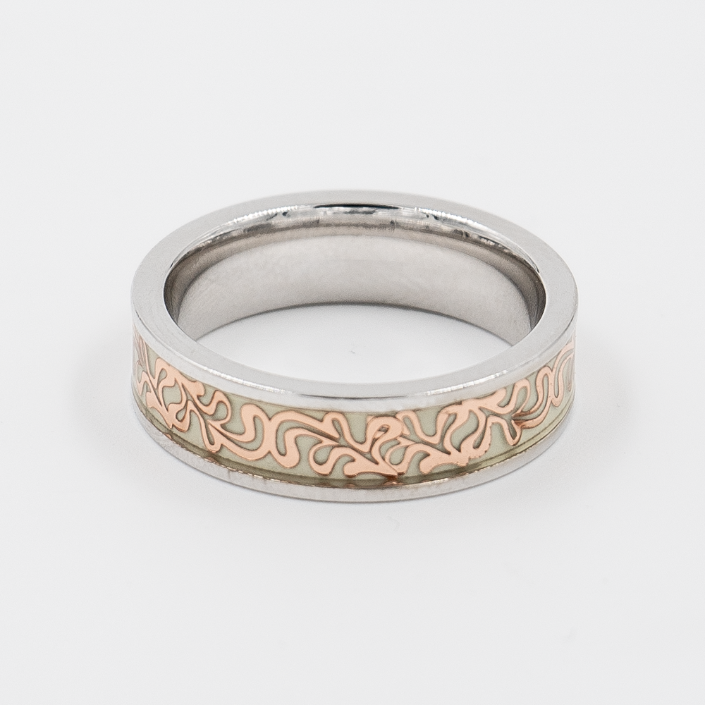 Silver dualform ring with rose gold vine-like patterns engraved