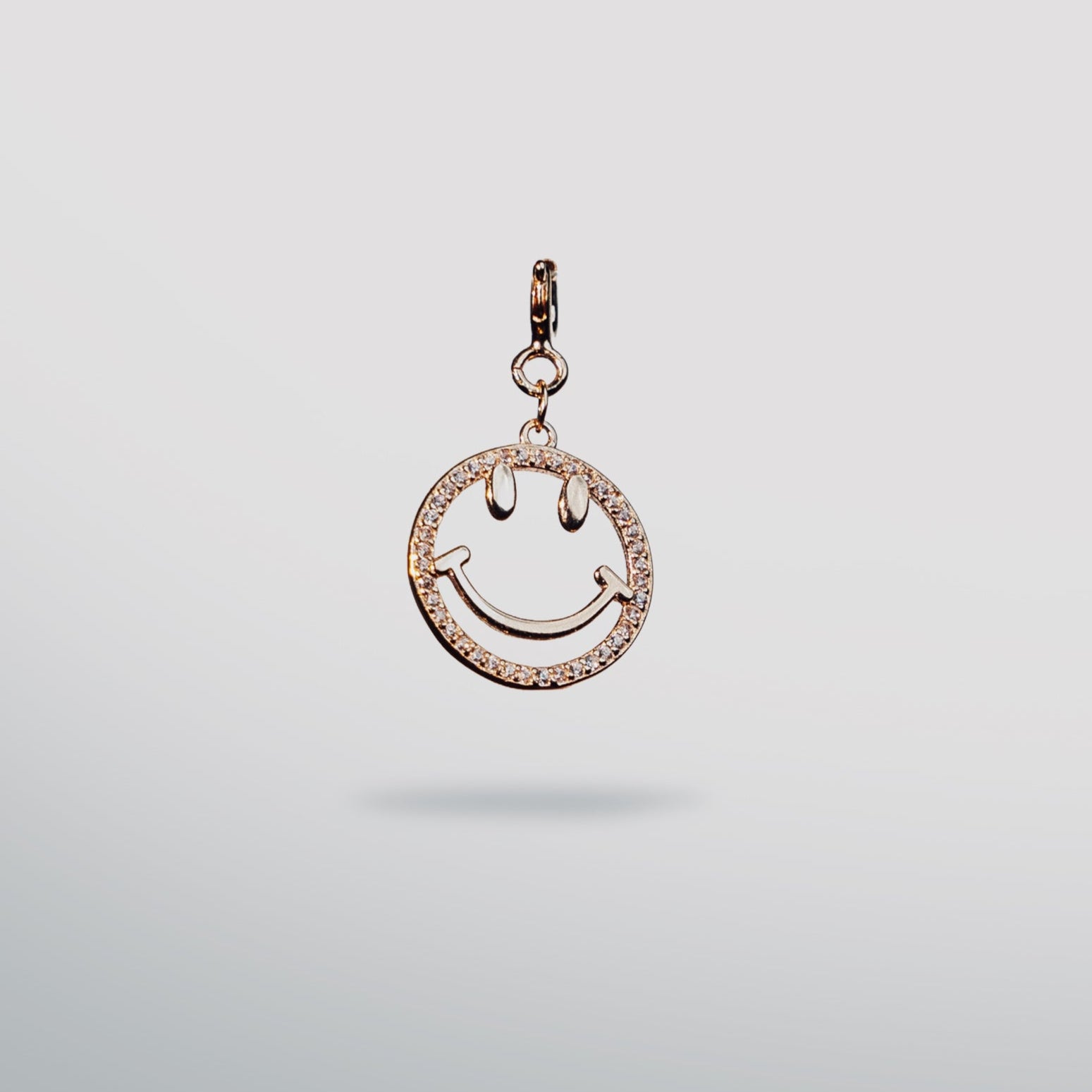 Sterling silver, rose gold smiley charm 