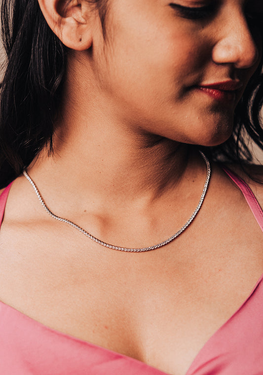 Sleek solitaire chain lifestyle.