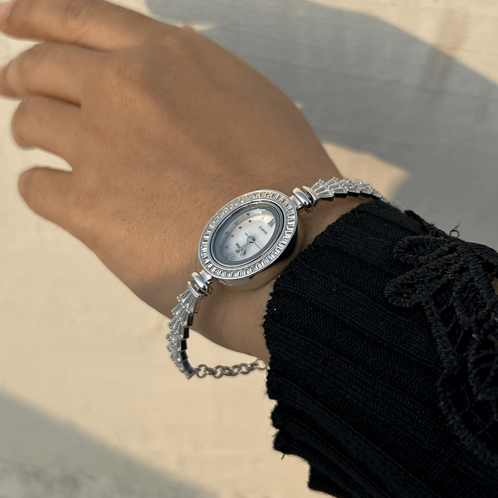 Silver wristwatch with zircon stones and elegant design, the band is stiff andd the lock is easy to use. it can be worn daily and in office and ocassionally. the watch is made in pure 925 silver 