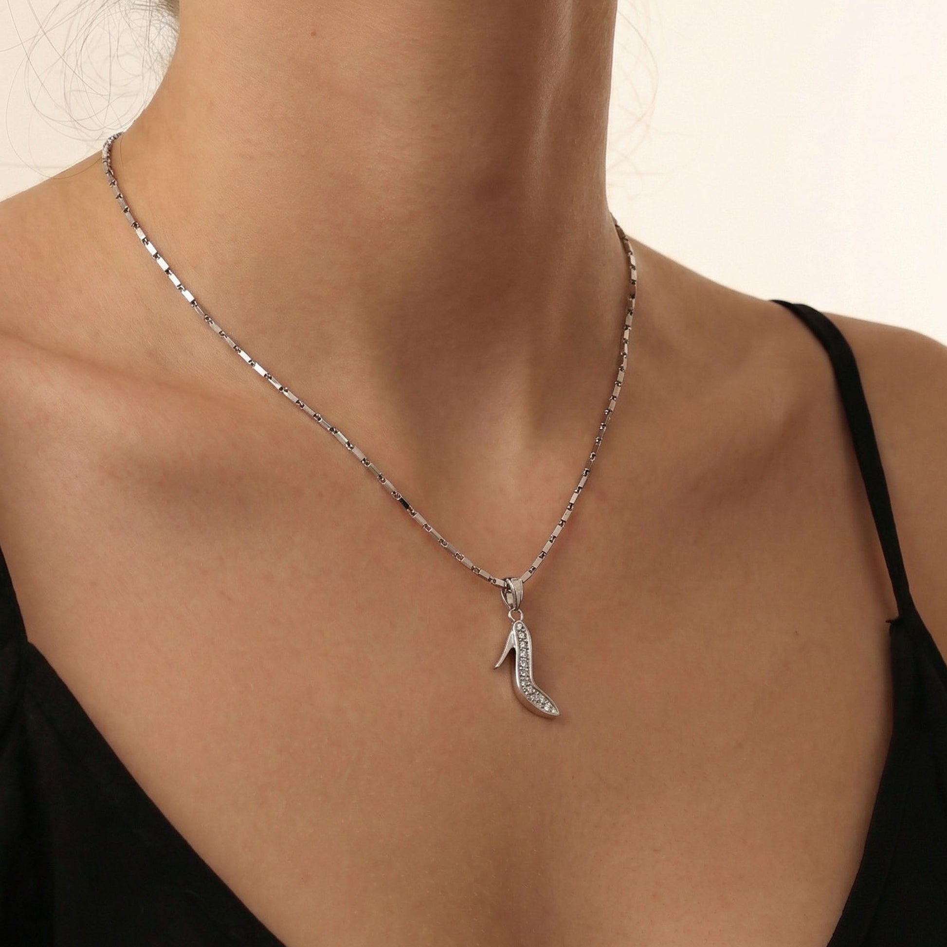 Heel charm worn in elfy silver chain. charm jewellery, bracelet charm, silver charms.