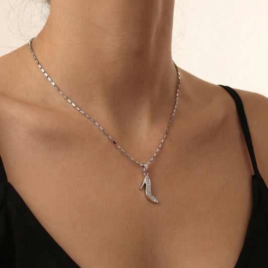 Heel charm worn in elfy silver chain. charm jewellery, bracelet charm, silver charms.
