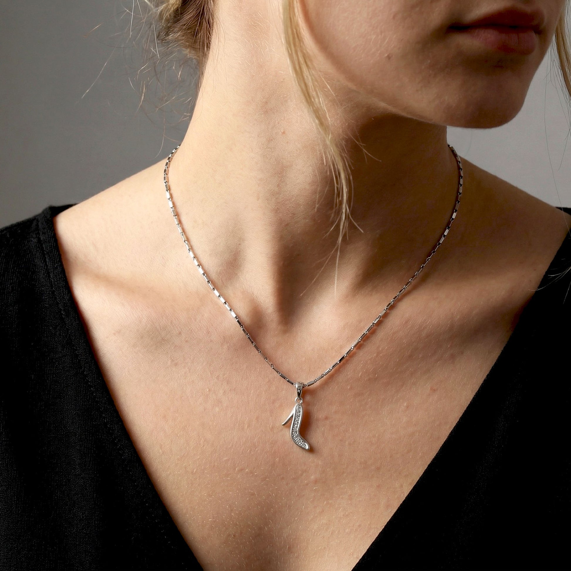 Stiletto charm worn in elfy silver chain. charm jewellery, bracelet charm, silver charms.