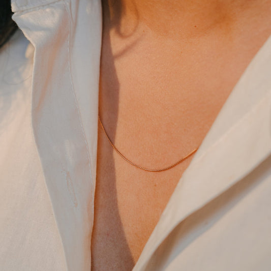 Sterling silver chain rose gold chain worn on a model