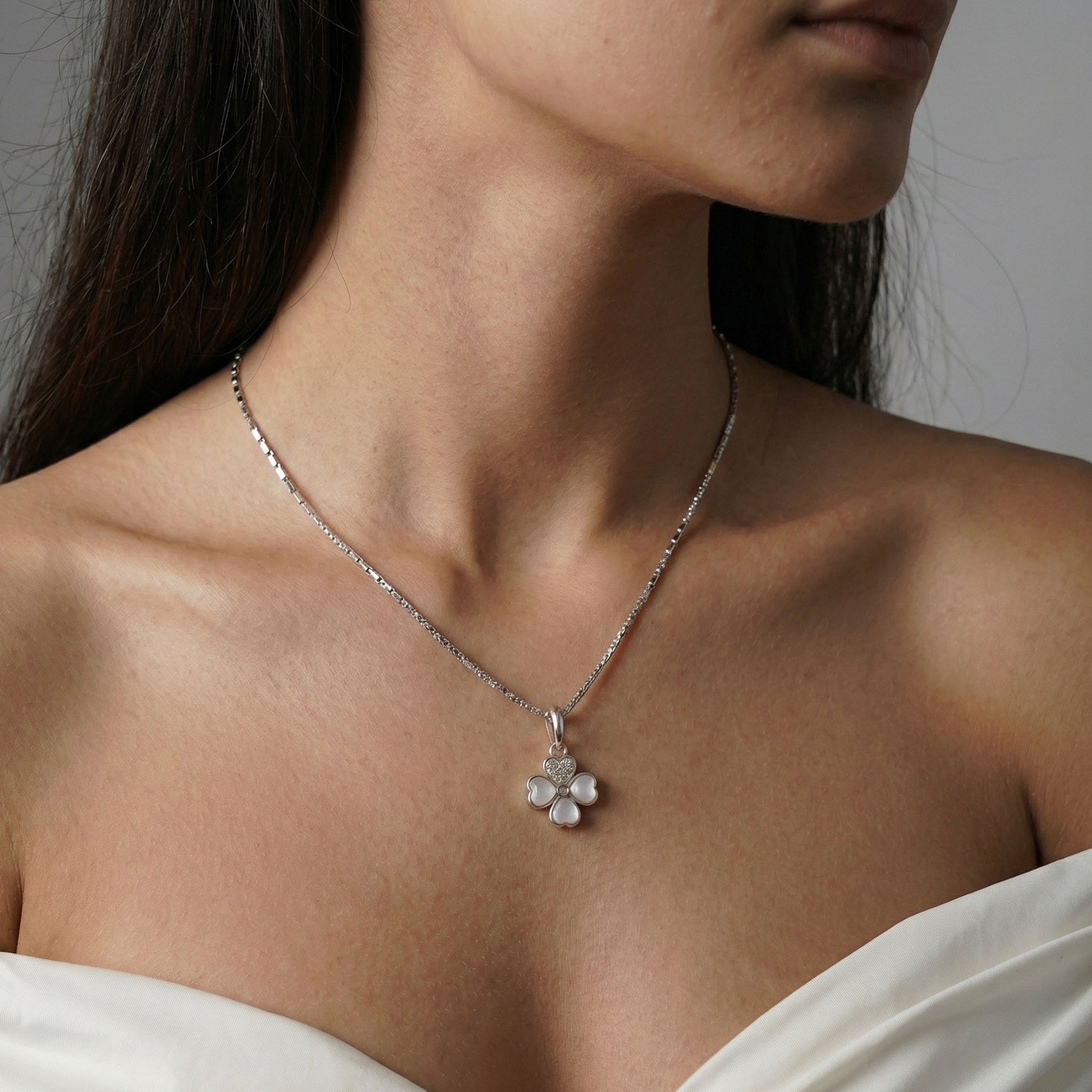 Nexus chain by elfy in silver with a clover charm which is called goodluck charm