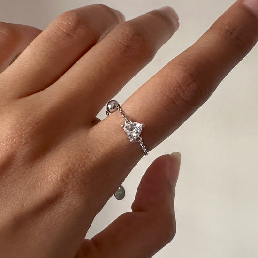Heart chain ring silver, adjustable chain in silver with a heart shaped white stone in middle