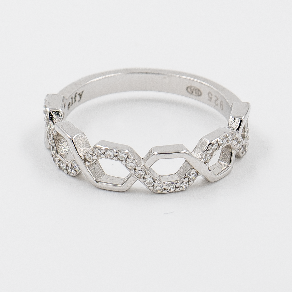 A silver ring with a honeycomb-inspired design, featuring interlocking hexagons and a halo of zircon stones around the band.