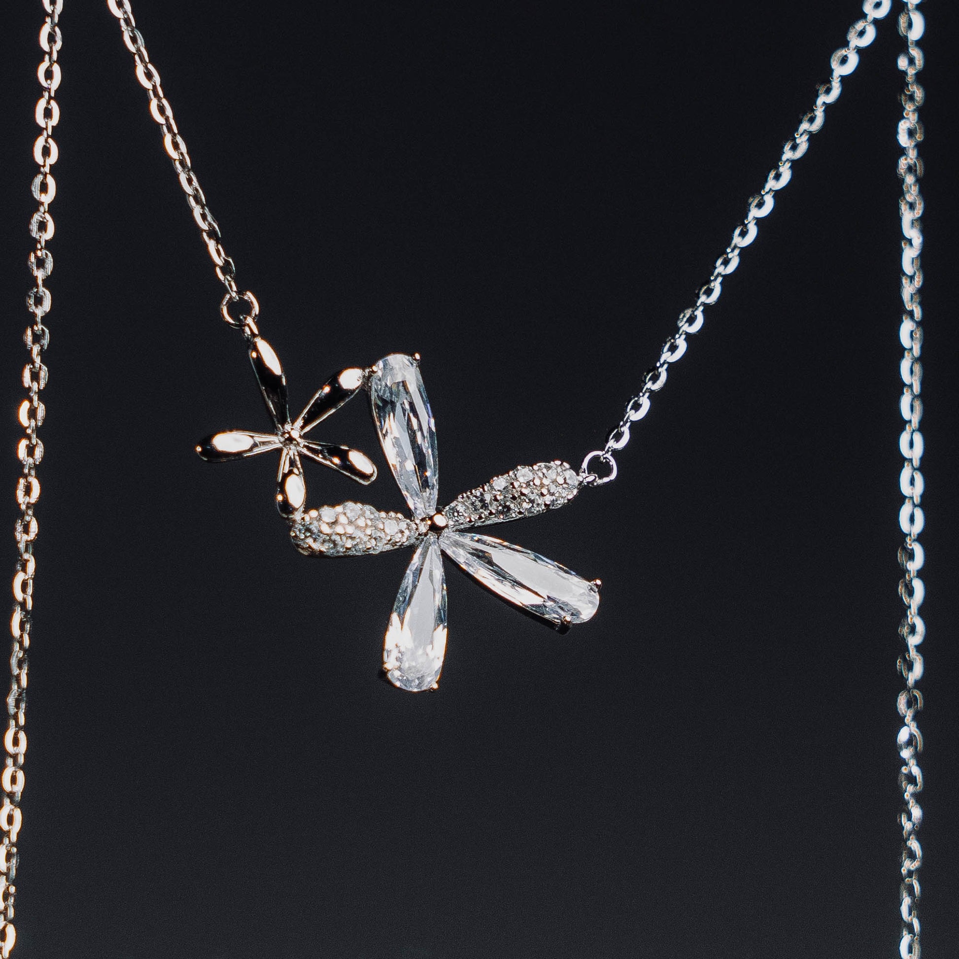 Elfy 925 Sterling Silver Twin Bloom Necklace featuring a sophisticated dual-flower design with one polished silver bloom and a second shimmering bloom set with marquise-cut crystals—An elegant nature-inspired jewelry gift