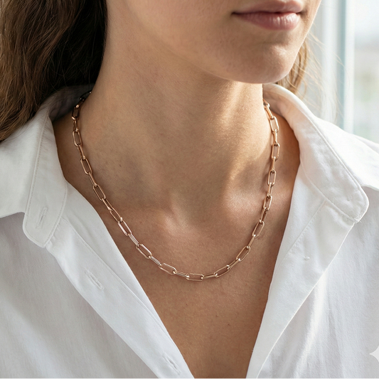 Sterling silver rose gold paperclip charm chain on models neck