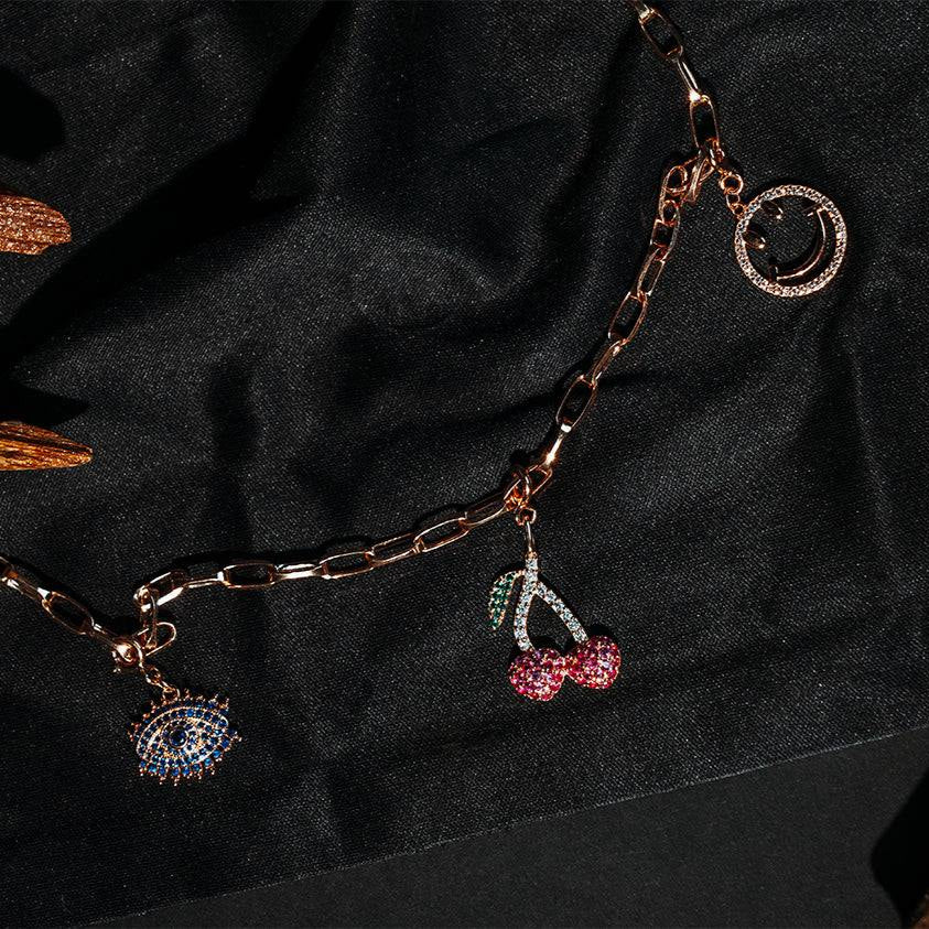 Sterling silver paperclip charm chain in rose gold with charms