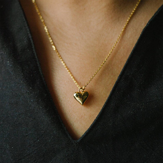 Stunning liquid heart pendant, 
gold plated, a solid silver heart which is gold plated in the neck