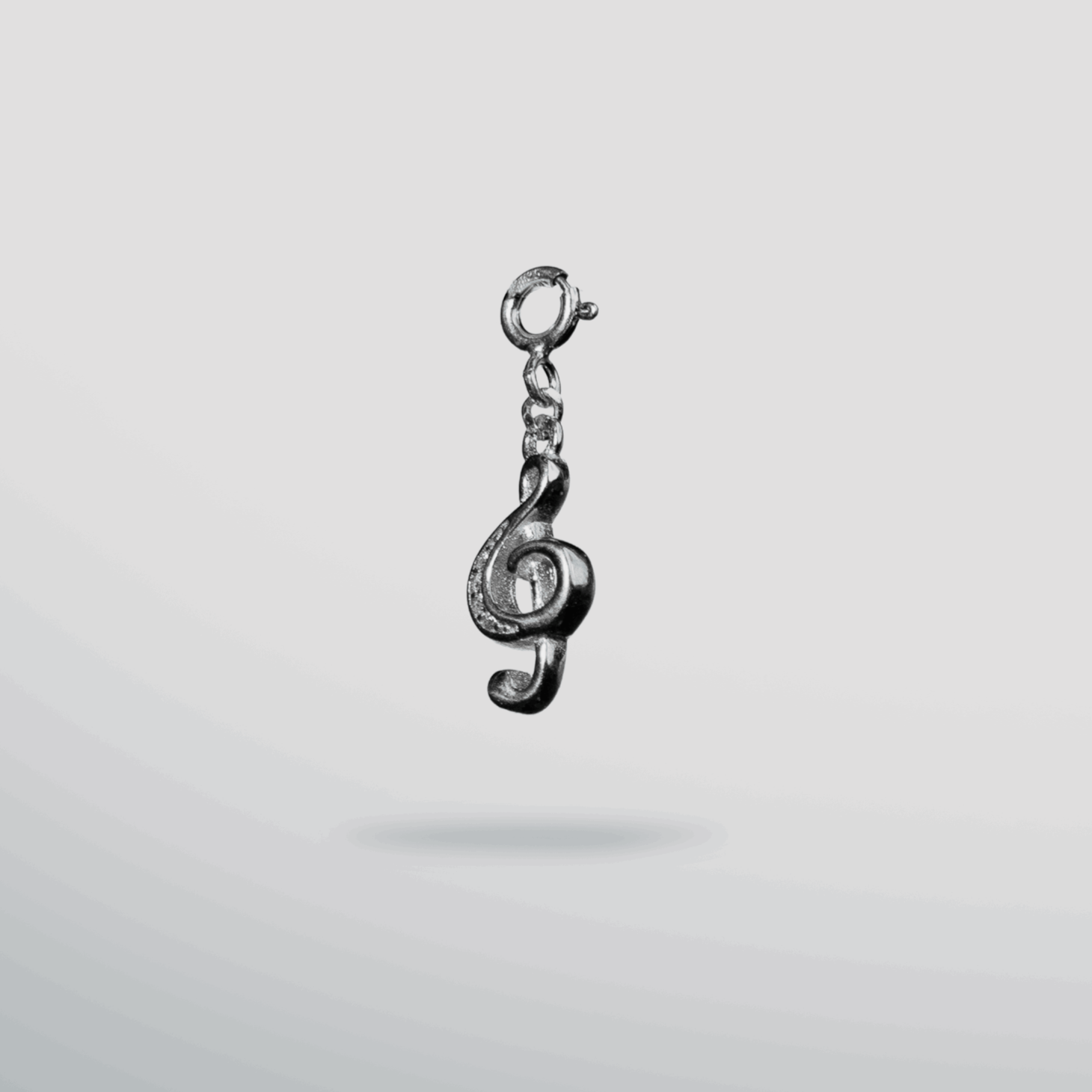 Sterling silver music note clef charm