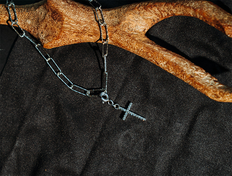 Sterling silver cross charm in bracelet, charm bracelet