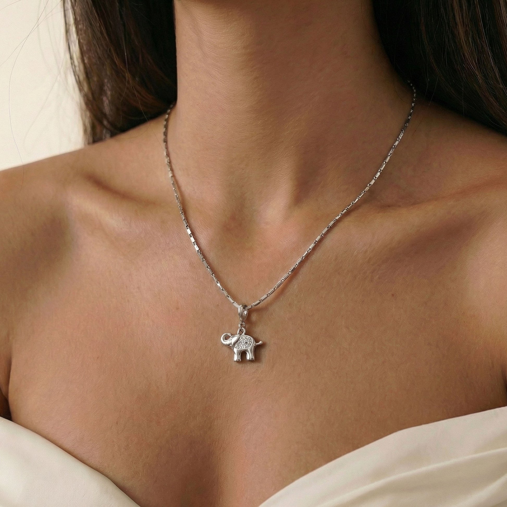 Elephant charm worn on a silver chain. Elfy 925 sterling silver, silver charms