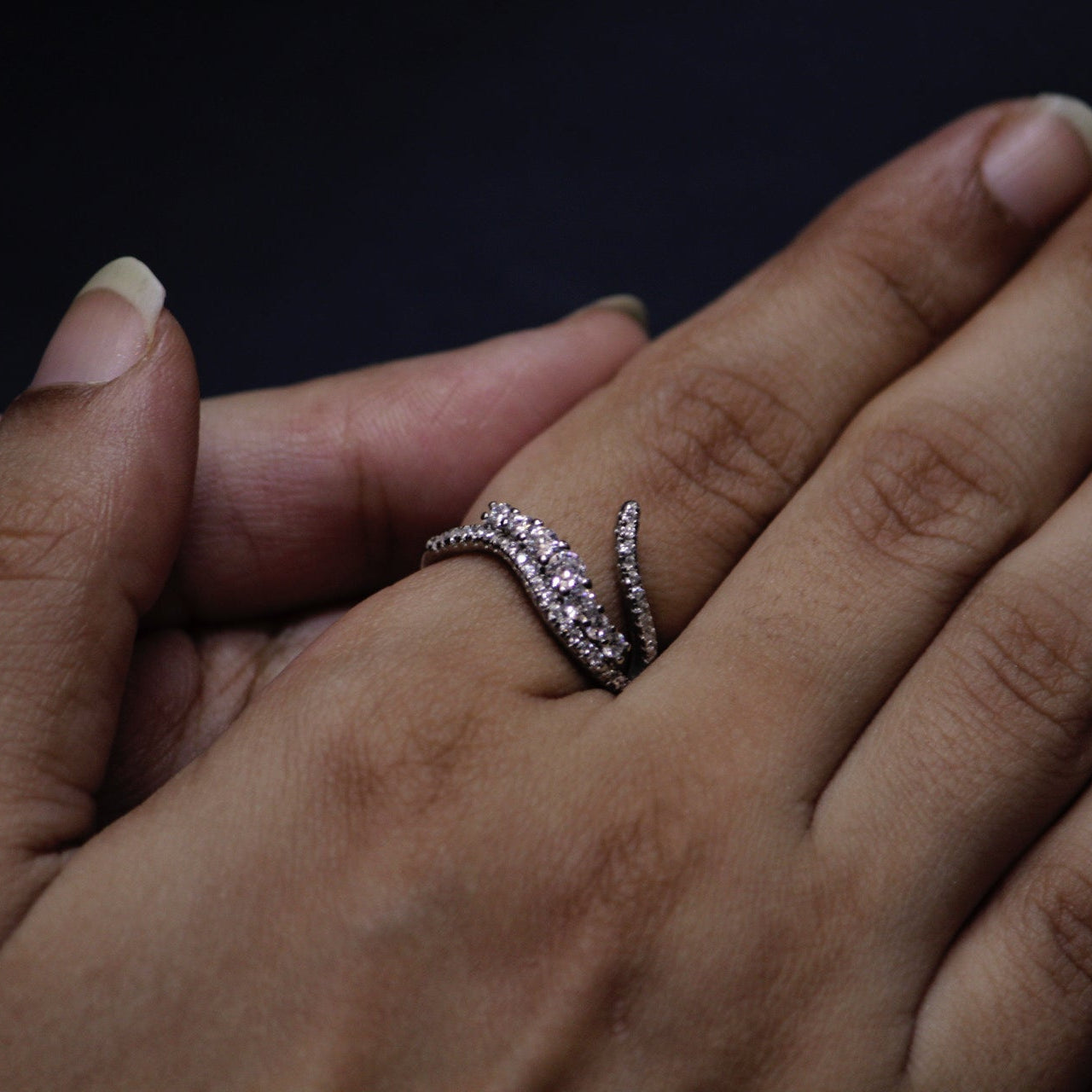Elfy Sterling silver stream ring on model's hand