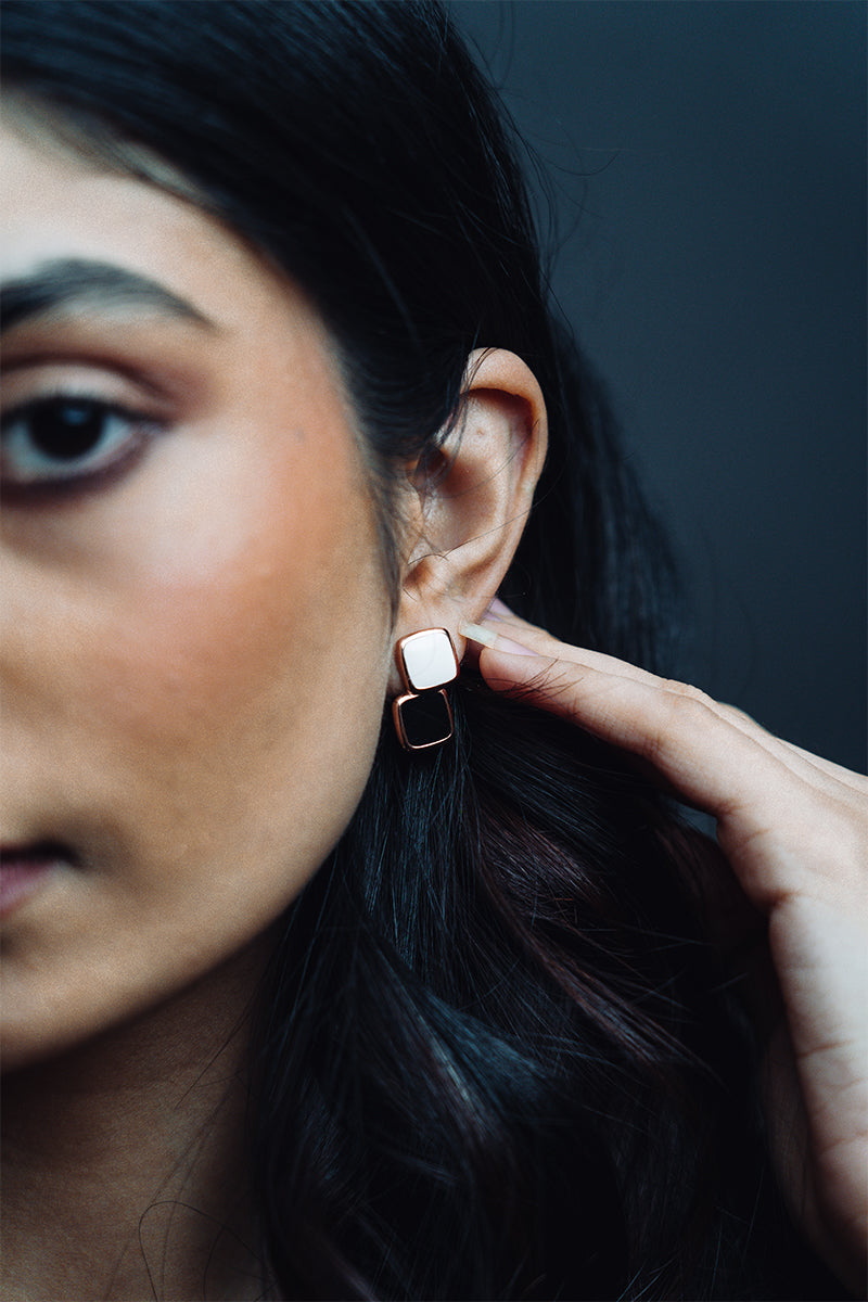 Square earrings with black and white color