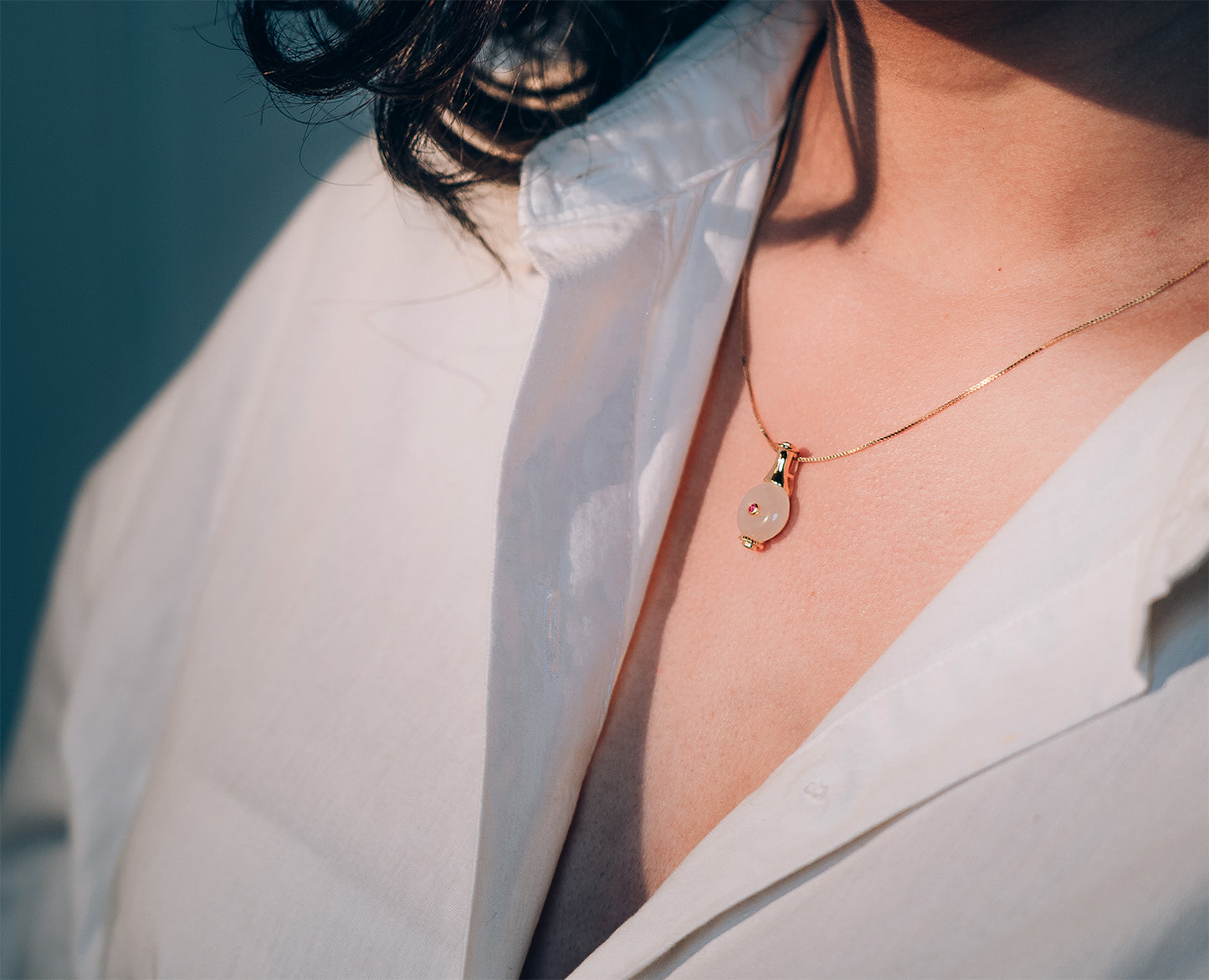 Sterling silver gold platted pendant and chain with pendant in bottle shape