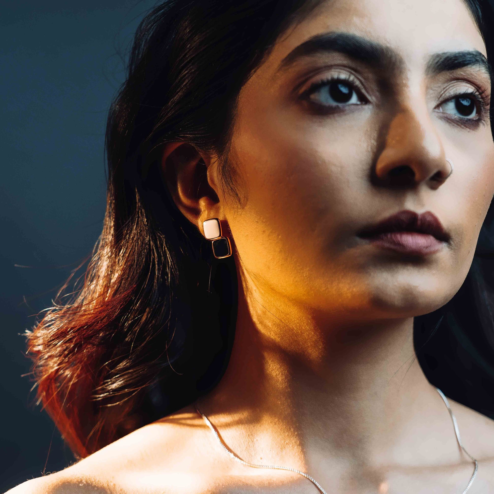 Square earrings with black and white color